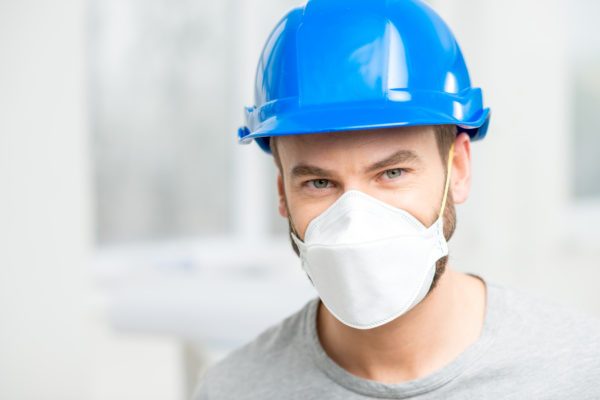builder with protective mask builder with protective mask